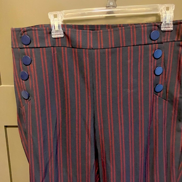 “Julie” navy trousers with red pin stripes and pocket button accents. - Picture 2 of 5